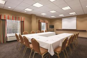 a conference room with a white table and chairs at Hampton Inn & Suites Greenfield in Greenfield +34 photos