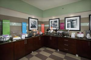 a room with wooden cabinets and a counter top at Hampton Inn Hanover in Hanover