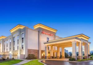 a rendering of a hotel exterior at Hampton Inn Havelock in Havelock
