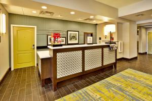 a lobby of a hospital with a yellow door at Hampton Inn Niagara Falls/ Blvd in Niagara Falls