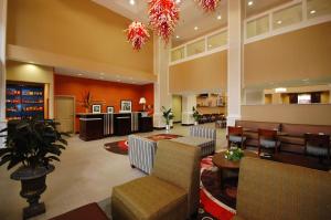 a lobby of a hospital with a waiting room at Hampton Inn Jackson/Flowood - Airport Area MS in Luckney