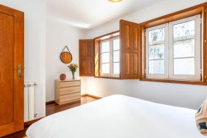 Postel nebo postele na pokoji v ubytování Casa da Sé by Sé Apartamentos