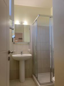 a bathroom with a sink and a shower at Casa di Terra in Gythio +60 photos