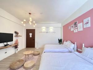 Postel nebo postele na pokoji v ubytování Brother Homestay