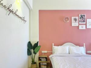 Postel nebo postele na pokoji v ubytování Brother Homestay