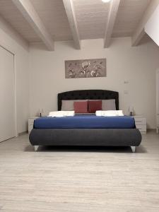 Postel nebo postele na pokoji v ubytování B&B La Fortezza