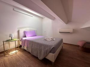 Postel nebo postele na pokoji v ubytování B&B La Fortezza
