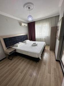Кровать или кровати в номере Alissa Suite