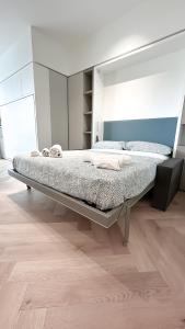 Ein Bett oder Betten in einem Zimmer der Unterkunft Appartamento Central Park - Affitti Brevi Italia