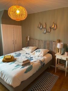 Postel nebo postele na pokoji v ubytování Ty Glaz