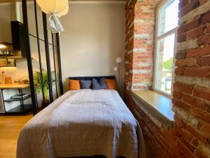 Postel nebo postele na pokoji v ubytování Vintage Charm Residence Apt 1
