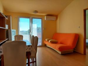 Гостиная зона в Apartmani Toni Vodice
