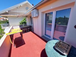 Балкон или терраса в Apartmani Toni Vodice