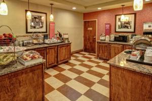 a restaurant with a buffet line with food at Hampton Inn Winchester KY in Winchester