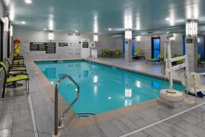 a large swimming pool in a hotel room at Hampton Inn LaPorte in LaPorte
