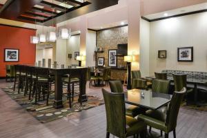 a dining room with a long table and chairs at Hampton Inn & Suites Big Spring in Big Spring