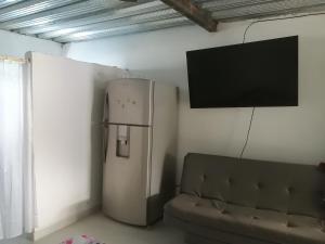 TV a/nebo společenská místnost v ubytování CASA TORO