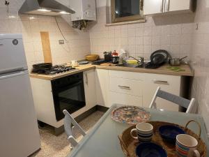 Cucina o angolo cottura di Attico con terrazzo panoramico a 200 mt dal Duomo