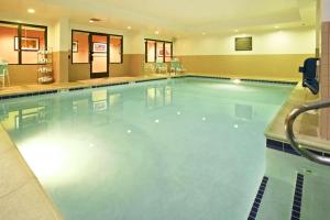 a large swimming pool in a hotel at Hampton Inn Marietta in Marietta