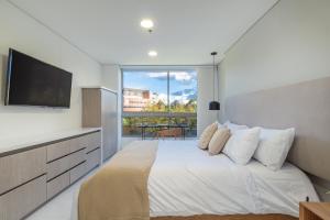 Postelja oz. postelje v sobi nastanitve PORTANOVA Suites by ADVENTU
