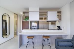 Kuhinja oz. manjša kuhinja v nastanitvi PORTANOVA Suites by ADVENTU