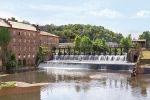 a waterfall in the middle of a body of water at Hampton Inn & Suites Prattville in Prattville