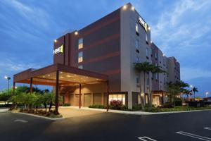 a rendering of the front of a hotel at Home2 Suites by Hilton Florida City in Florida City