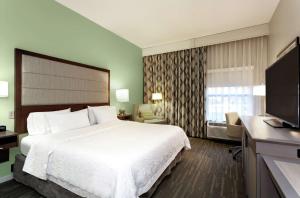 Postel nebo postele na pokoji v ubytování Hampton Inn Melbourne