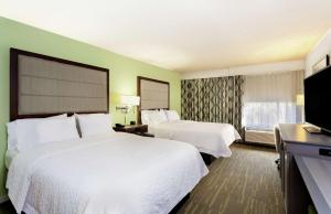 Postel nebo postele na pokoji v ubytování Hampton Inn Melbourne