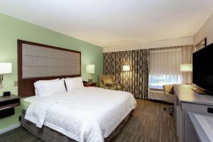 Postel nebo postele na pokoji v ubytování Hampton Inn Melbourne