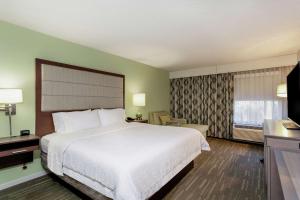 Postel nebo postele na pokoji v ubytování Hampton Inn Melbourne