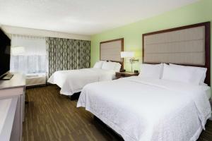 Postel nebo postele na pokoji v ubytování Hampton Inn Melbourne