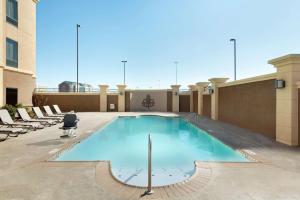 a swimming pool on the roof of a building at Hampton Inn West Monroe in West Monroe