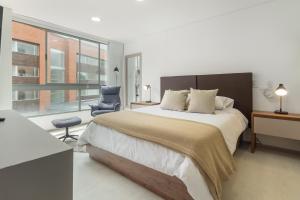 Postelja oz. postelje v sobi nastanitve PORTANOVA Suites by ADVENTU