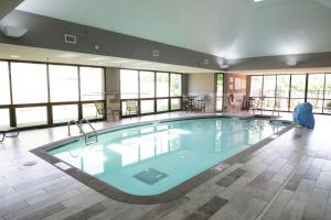 a large swimming pool in a hotel room at Hampton Inn Muskogee in Muskogee