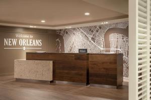 a lobby with a welcome to new orleans sign at Hampton Inn Downtown / French Quarter Area in New Orleans