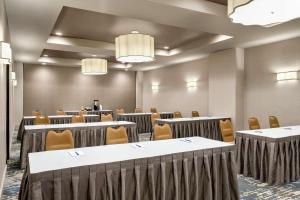 a conference room with tables and chairs in it at Hampton Inn Downtown / French Quarter Area in New Orleans