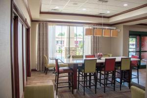 a dining room with a table and chairs at Hampton Inn Murphy in Murphy