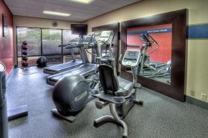 a gym with treadmills and ellipticals in a room at Hampton Inn New Bern in New Bern