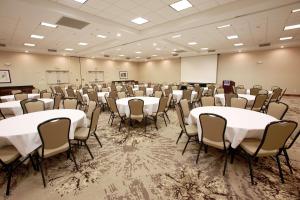 a conference room with tables and chairs in it at Hampton Inn & Suites Nampa at the Idaho Center in Nampa