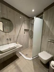 Ένα μπάνιο στο ANAX APARTMENTS PARGA +21 φωτογραφίες