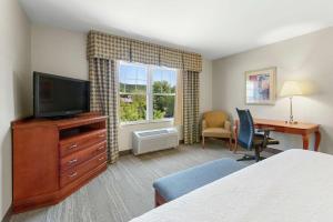 Ein Bett oder Betten in einem Zimmer der Unterkunft Hampton Inn & Suites North Conway