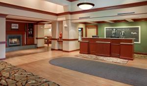 a lobby with a bar in the middle of a room at Hampton Inn & Suites North Conway in North Conway +26 photos