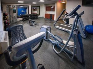 a gym with two treadmills and a treadmill at Hampton Inn Edmond in Edmond