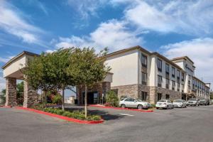 a rendering of a building with cars parked in a parking lot at Hampton Inn Norco/Corona in Norco