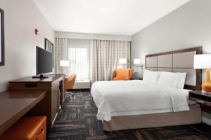 Postel nebo postele na pokoji v ubytování Hampton Inn Paris