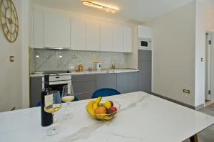 Kuchyňa alebo kuchynka v ubytovaní Luxury Apartment Veronika