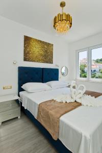 Posteľ alebo postele v izbe v ubytovaní Luxury Apartment Veronika