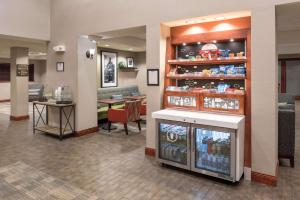 a lobby of a hotel with a restaurant at Hampton Inn Branson - Branson Hills in Branson