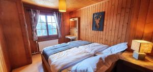 Letto o letti in una camera di Auberge le Mont-Gelé